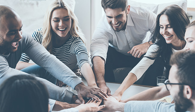 workplace team in a huddle